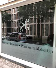 Körperkunst Tattoo & Piercing Bild 4