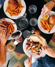 Dig in! We have  HUGE menu - pizza, sandwiches, burgers, wraps, salads, sides, brews, and more