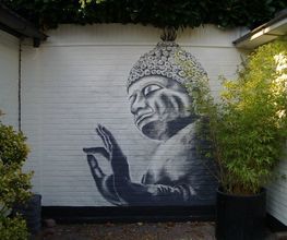 muurschildering tuin Boeddha