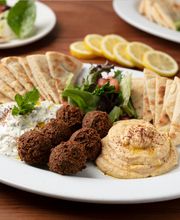 Falafel Combo Appetizer: Falafels are vegan & made in-house from fresh garbanzo beans & herbs