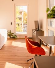Wohnzimmer und Workspace des Urban Comforts