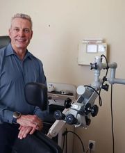 Andrew de Jong, MD, inside examination room