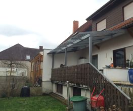 Terrassenüberdachung mit Dachüberstand Schüco PRC 50