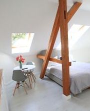 Studio Apartment (ohne Sauna) im Dachgeschoss:
Wohn/Schlafbereich mit Küche